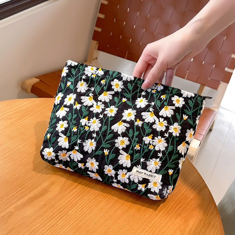 White Daisy Makeup Bag within Black