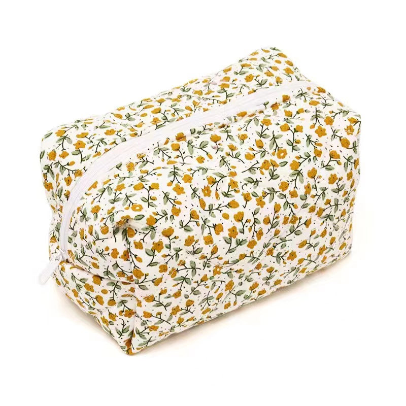 Floral makeup bag within Orange