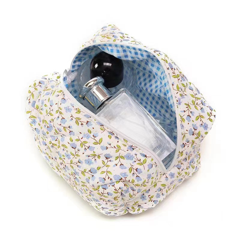 Floral makeup bag within Blue